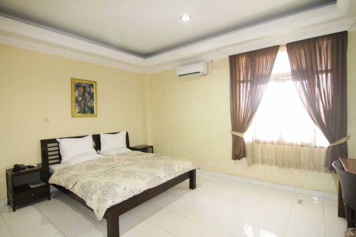 Suite, 1 cama doble | Escritorio, wifi gratis, ropa de cama