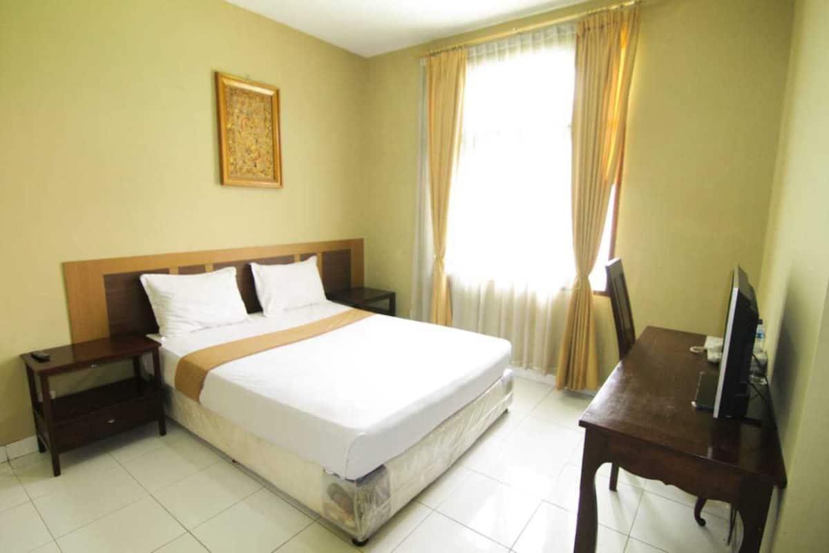 Habitación Deluxe doble | Escritorio, wifi gratis, ropa de cama