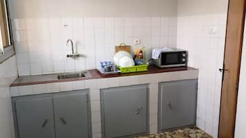 Apartment, Non Smoking | Private kitchen | Full-sized fridge, microwave, oven, stovetop