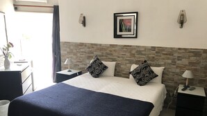Quarto casal ou duplo | Berços grátis, camas extras/dobráveis (sobretaxa), Wi-Fi de cortesia
