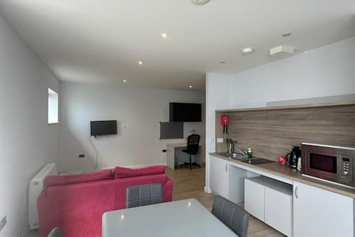 Departamento Deluxe, con acceso para personas discapacitadas | Cocina privada | Microondas, parrilla de estufa, tetera eléctrica y tostadora