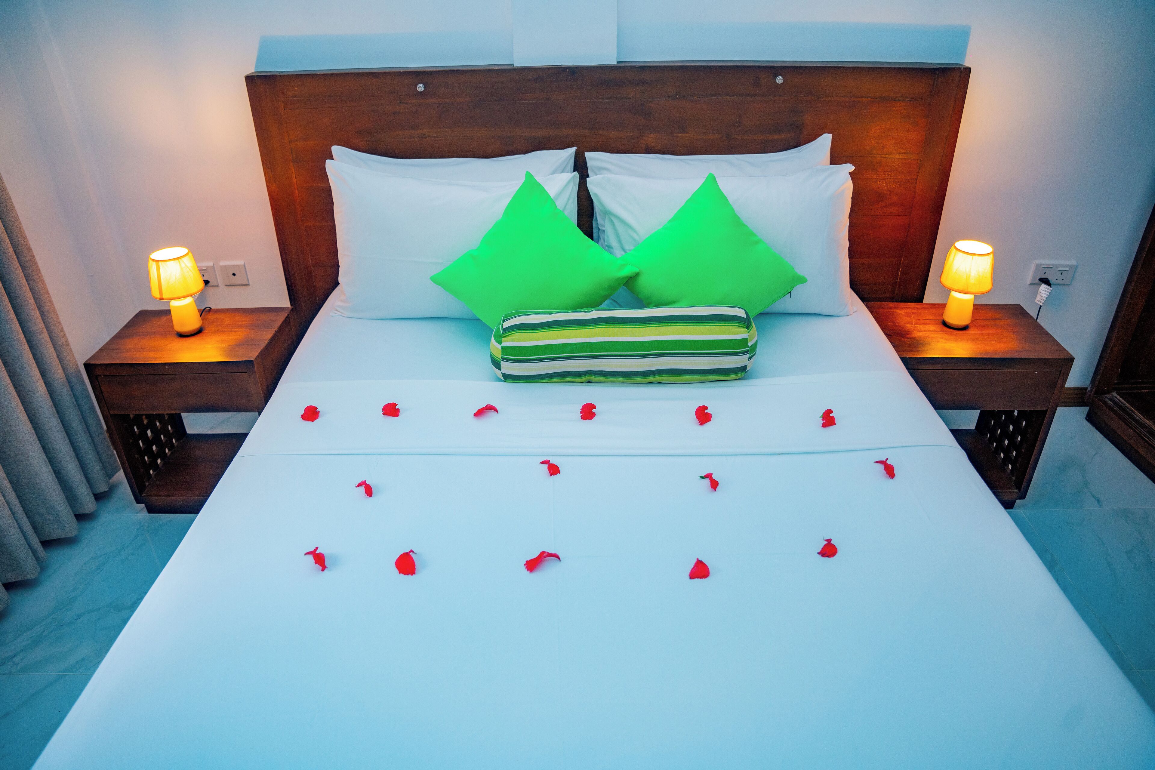 Premium bedding, blackout curtains, soundproofing, iron/ironing board