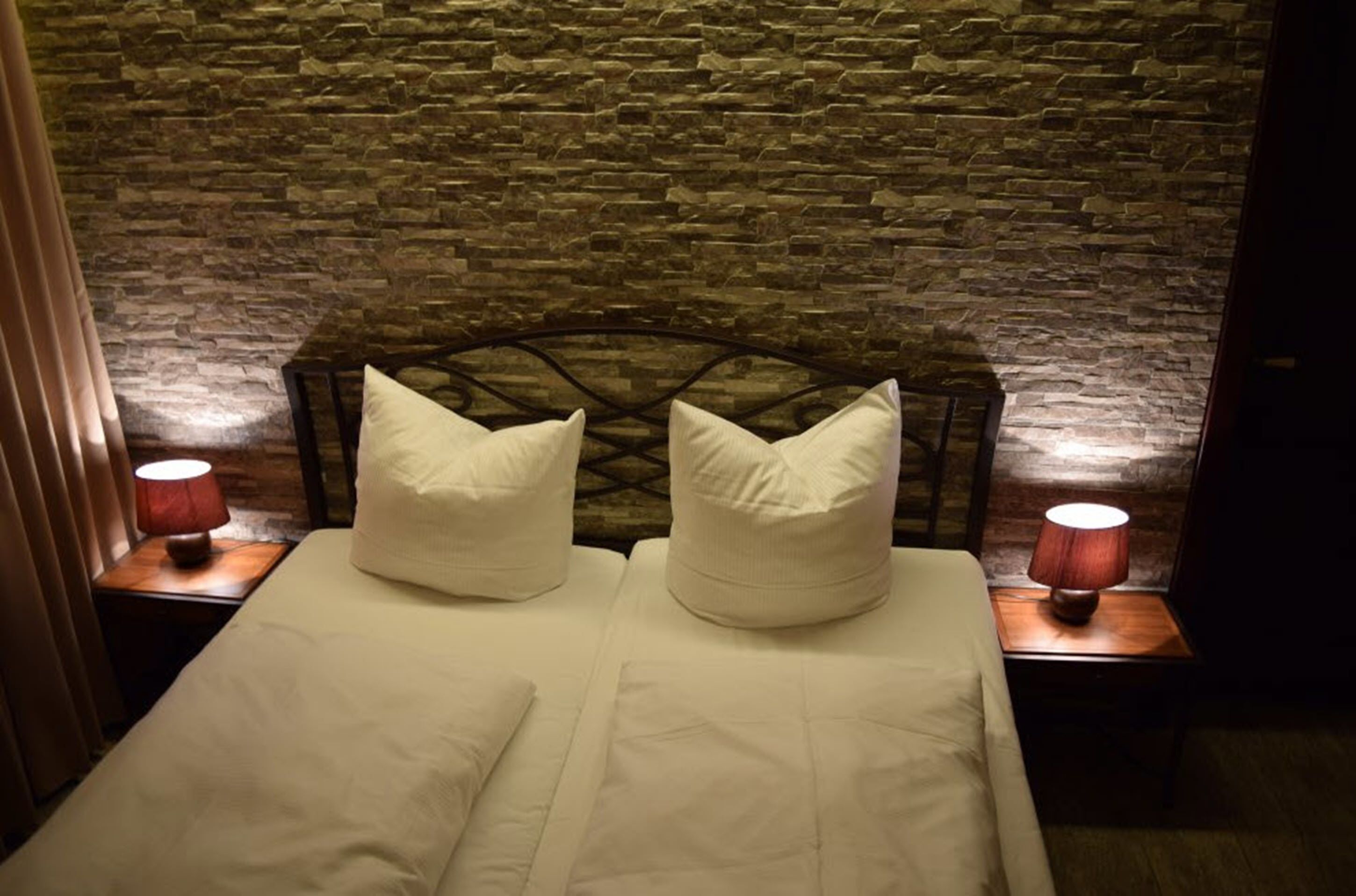 Blackout drapes, iron/ironing board, free WiFi, bed sheets