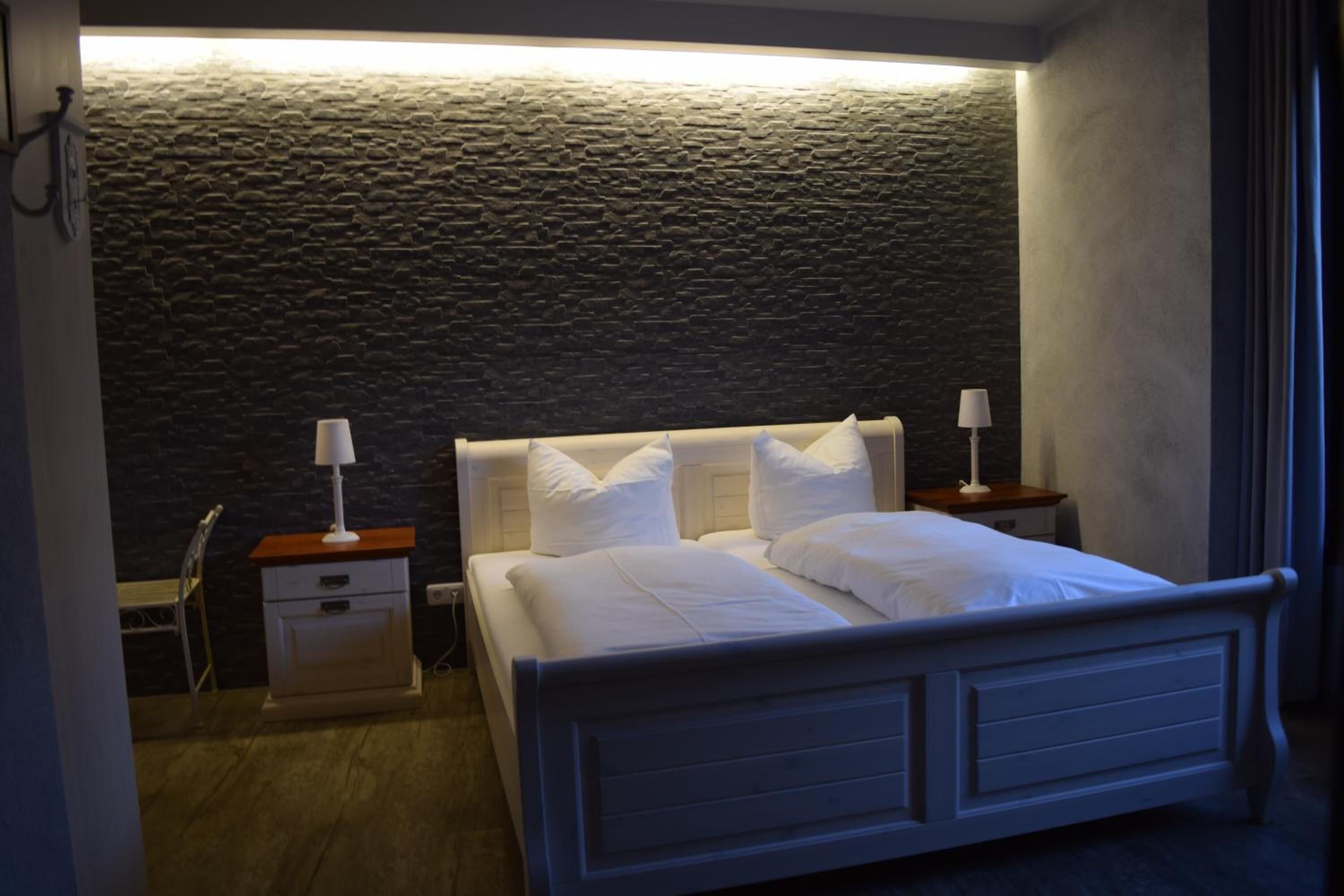 blackout curtains, iron/ironing board, free wifi, bed sheets