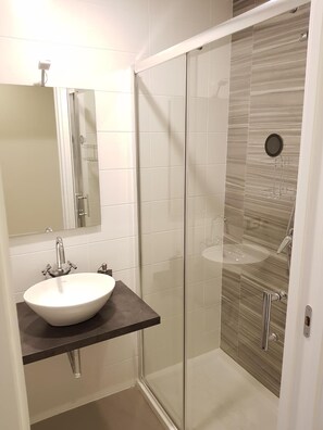 Shower, free toiletries, hair dryer, towels