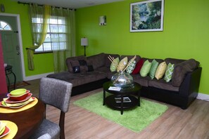 Comfort Apartment, 1 Queen Bed with Sofa bed, Non Smoking | Living area | Flat-screen TV - Jubilee Gardens Freeport (Freeport)