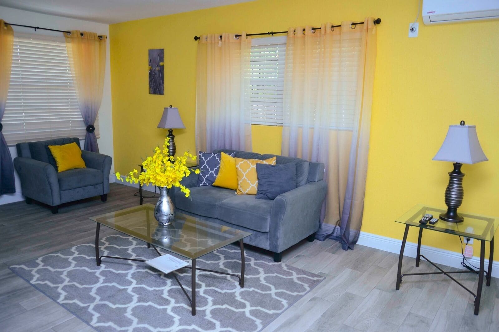 Apartment, Accessible, Private Bathroom | Living room | Flat-screen TV