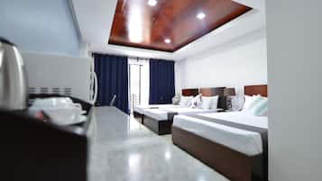Superior Family Room | Minibar, in-room safe, desk, soundproofing