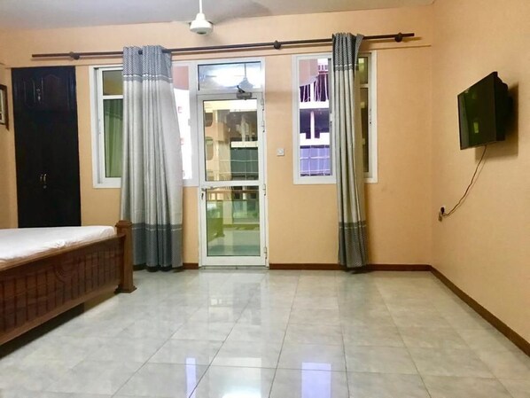 Blackout drapes, iron/ironing board, rollaway beds, free WiFi