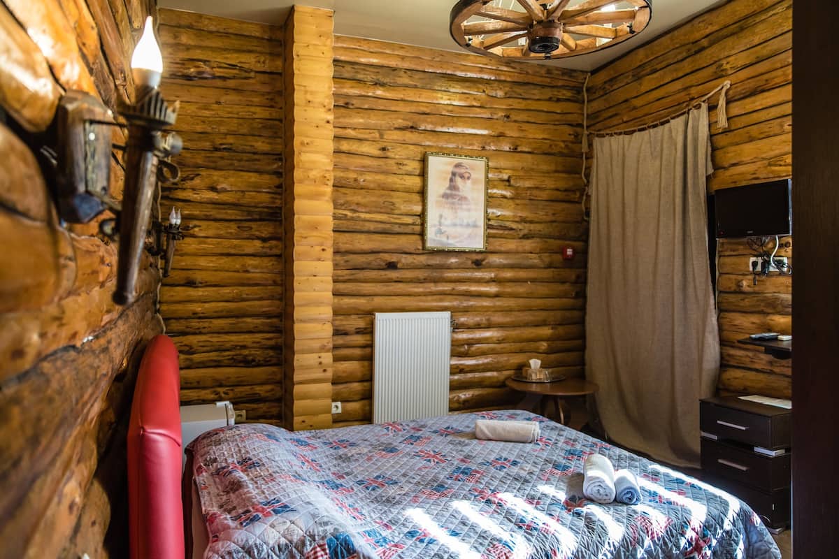 Habitación estándar, 1 cama King size, para no fumadores | Ropa de cama de alta calidad y cortinas blackout