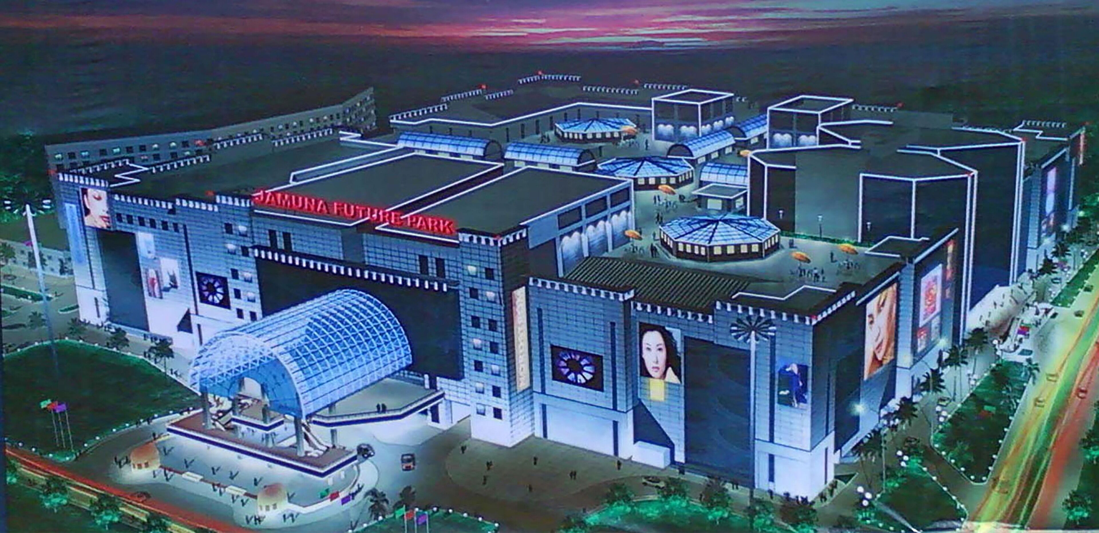 A large, modern building with a prominent dome structure, multiple levels, and a large entrance area.