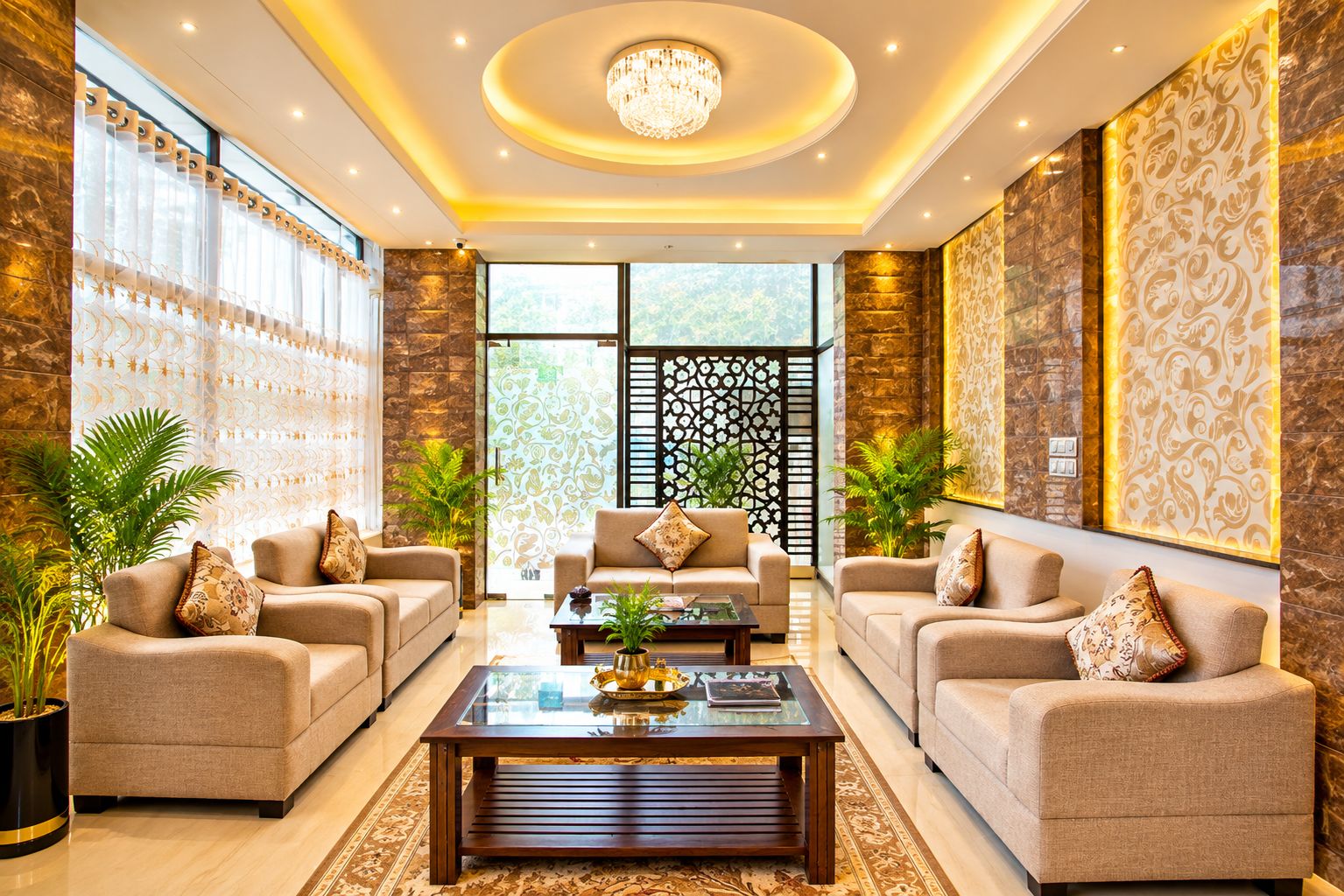 A spacious living room with two sofas, a coffee table, and decorative plants.