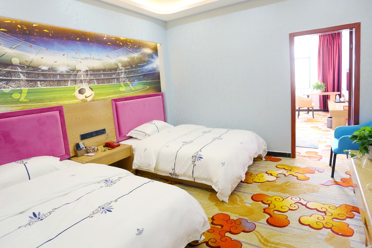 Deluxe Suite | Premium bedding, desk, blackout curtains, soundproofing