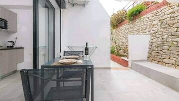 Superior Condo, Garden View | Terrace/patio