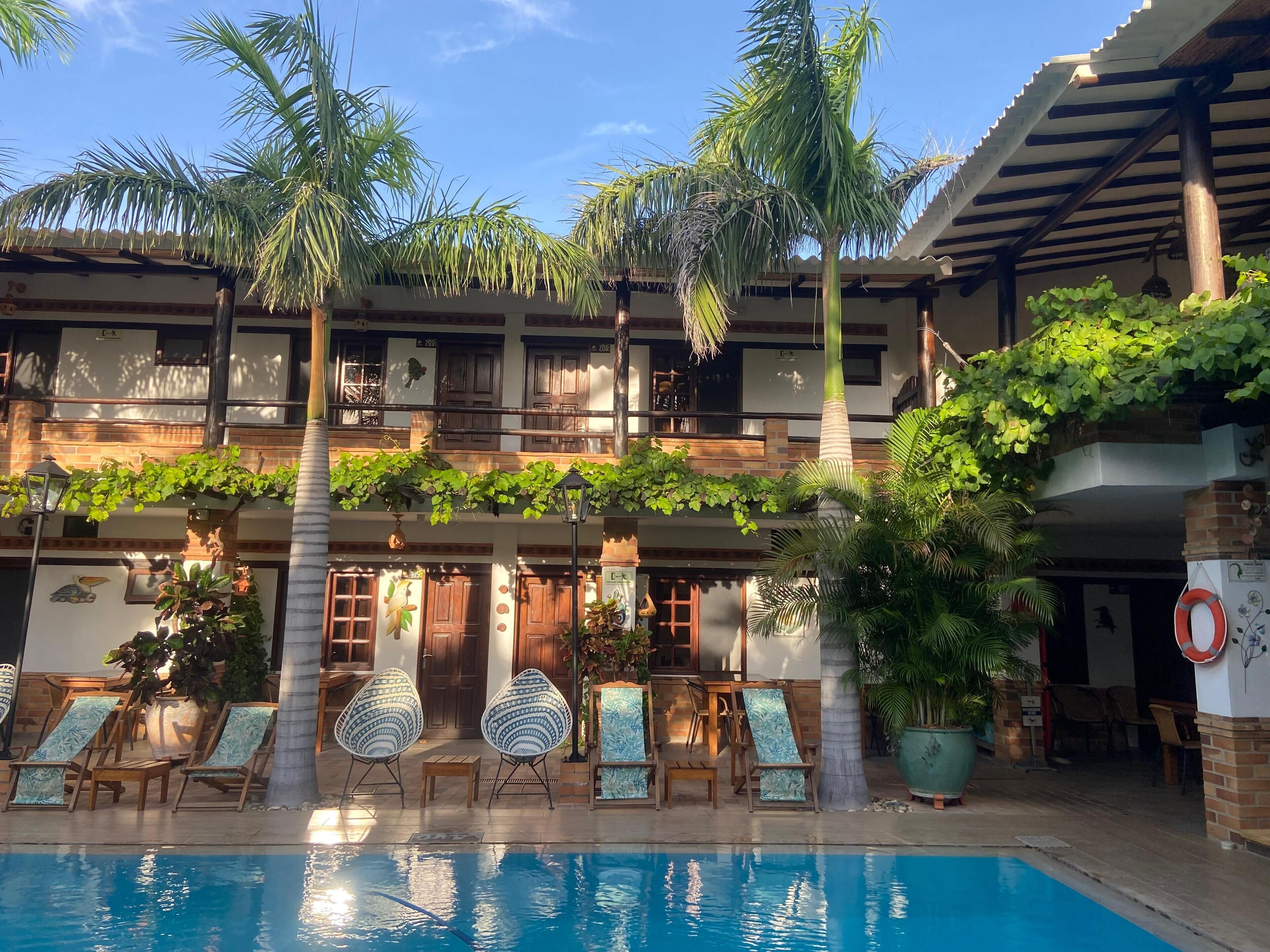 outdoor pool, open 8:30 am to 9:00 pm, pool loungers