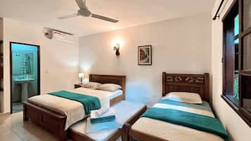 Family Room | Pillowtop beds, iron/ironing board, free WiFi, bed sheets