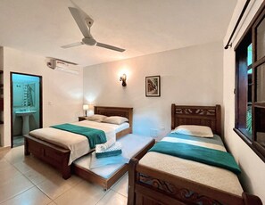 Family Room | Pillow-top beds, iron/ironing board, free WiFi, bed sheets - Camali Hotel (Santa Marta)