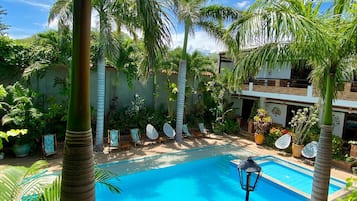 Outdoor pool, open 8:30 AM to 9:00 PM, sun loungers