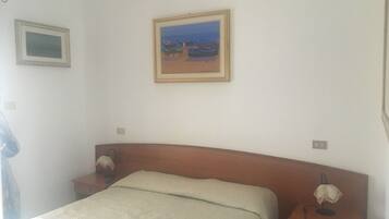 Desk, blackout curtains, free cots/infant beds, free WiFi