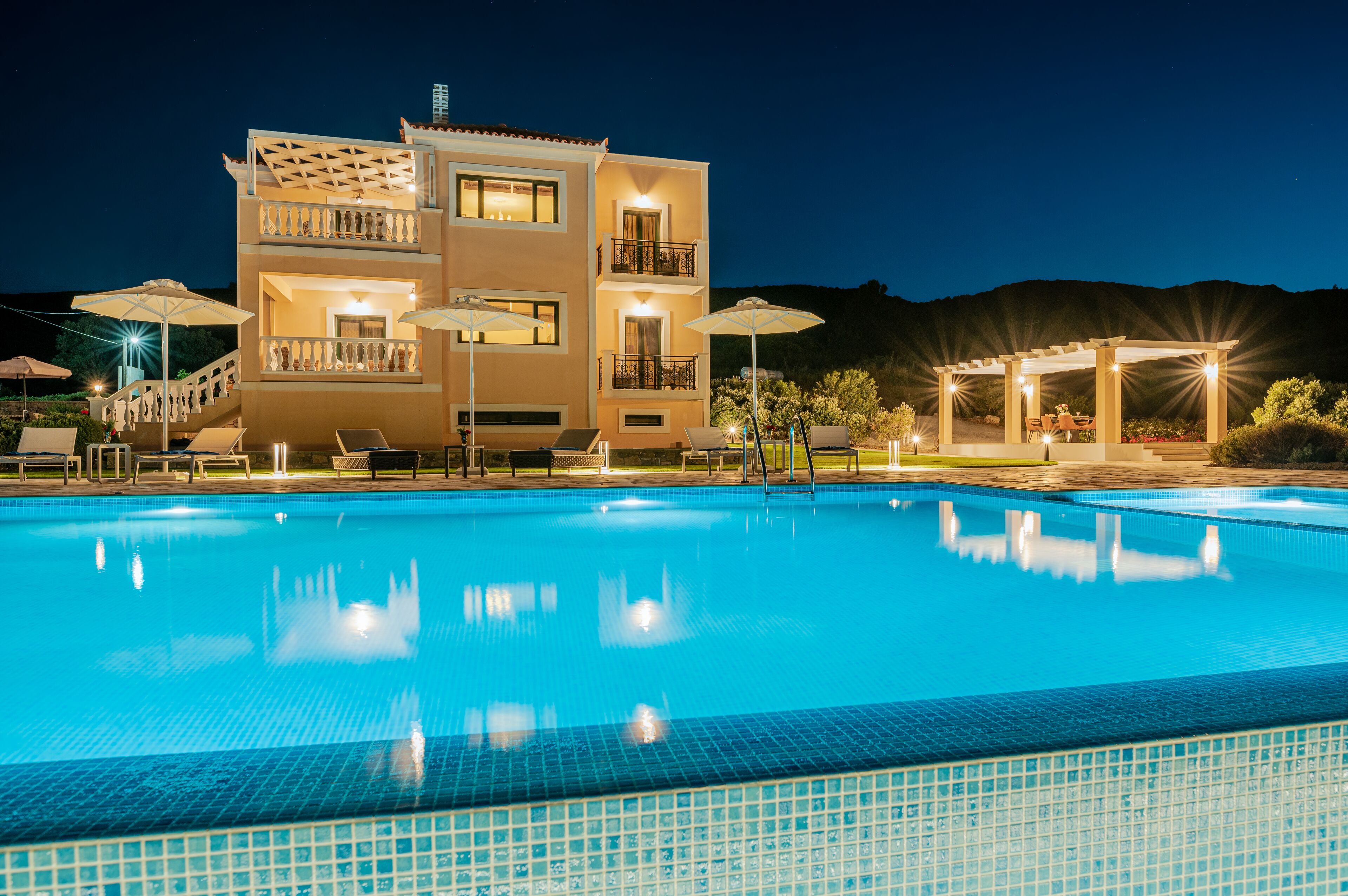 Seasonal outdoor pool, open 10:00 AM to 6:00 PM, pool umbrellas