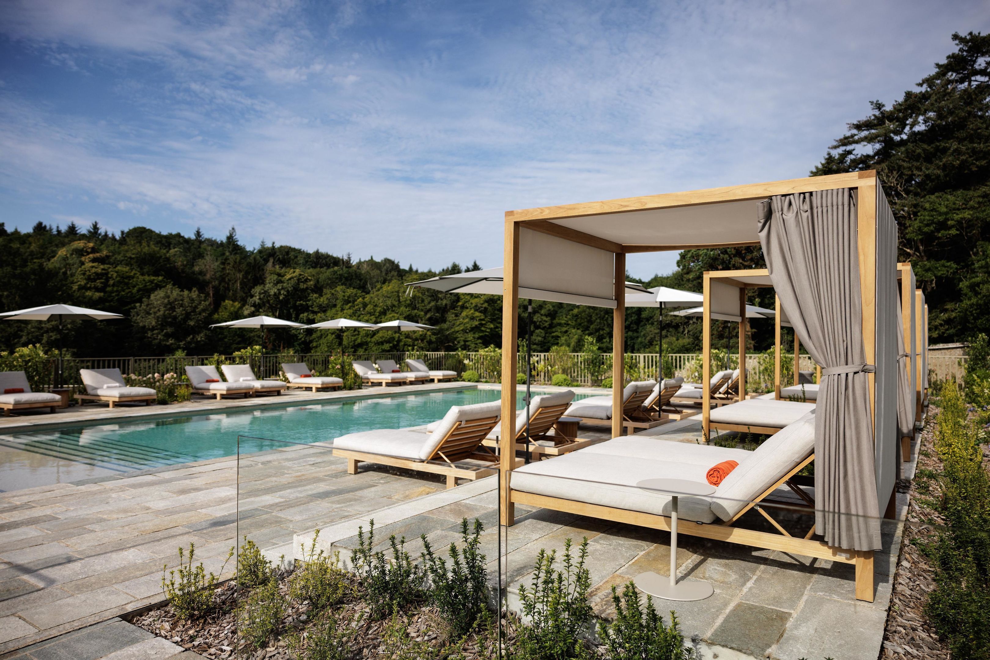 Indoor pool, seasonal outdoor pool, pool umbrellas, pool loungers