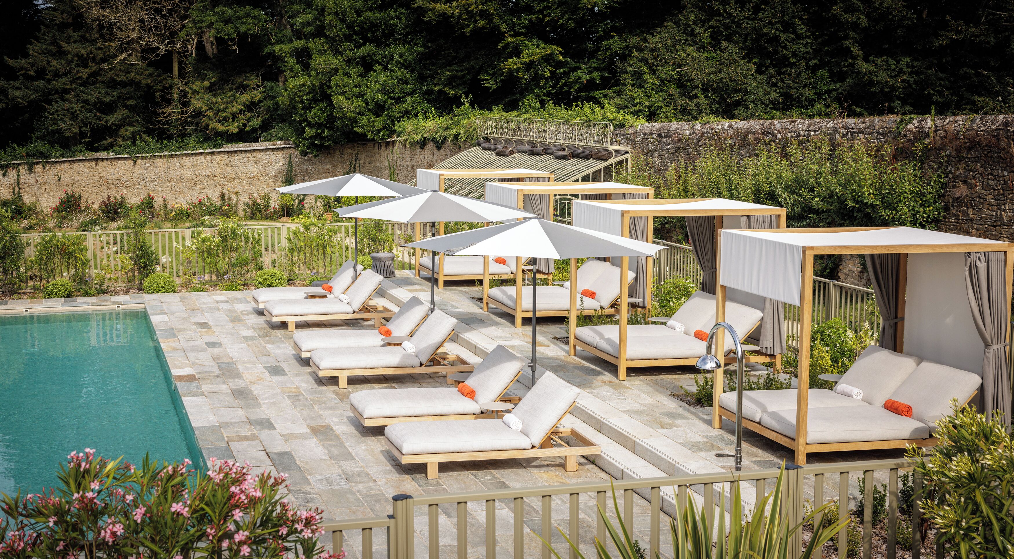 indoor pool, seasonal outdoor pool, pool umbrellas, pool loungers