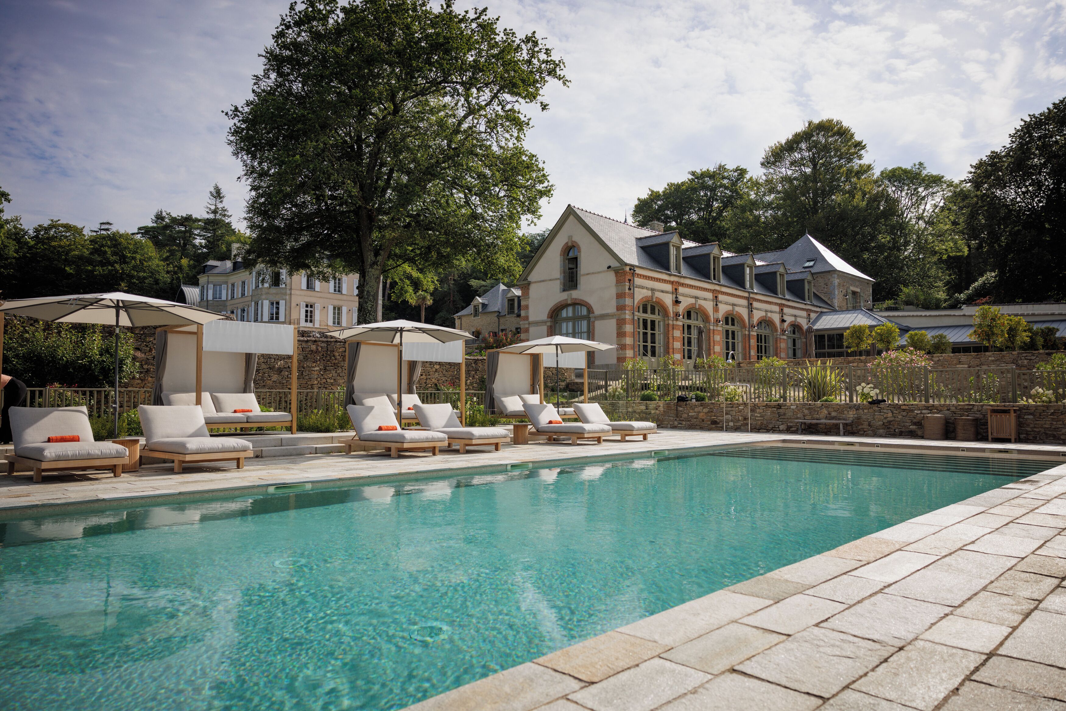 indoor pool, seasonal outdoor pool, pool umbrellas, pool loungers