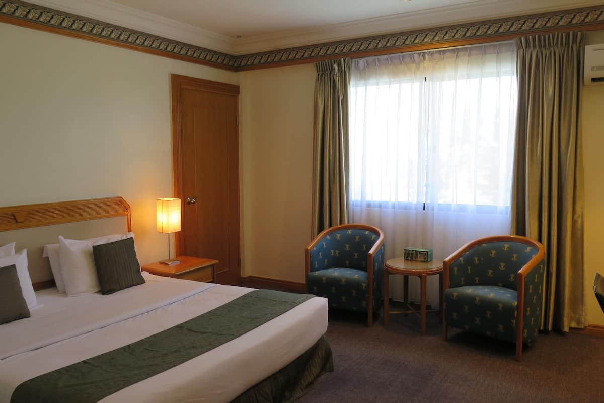 standard double room | in-room safe, desk, laptop workspace, blackout curtains