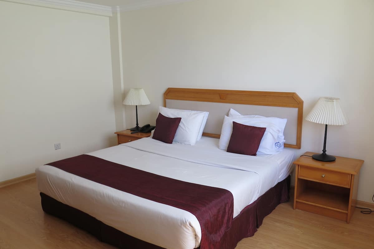 standard apartment | in-room safe, desk, laptop workspace, blackout curtains