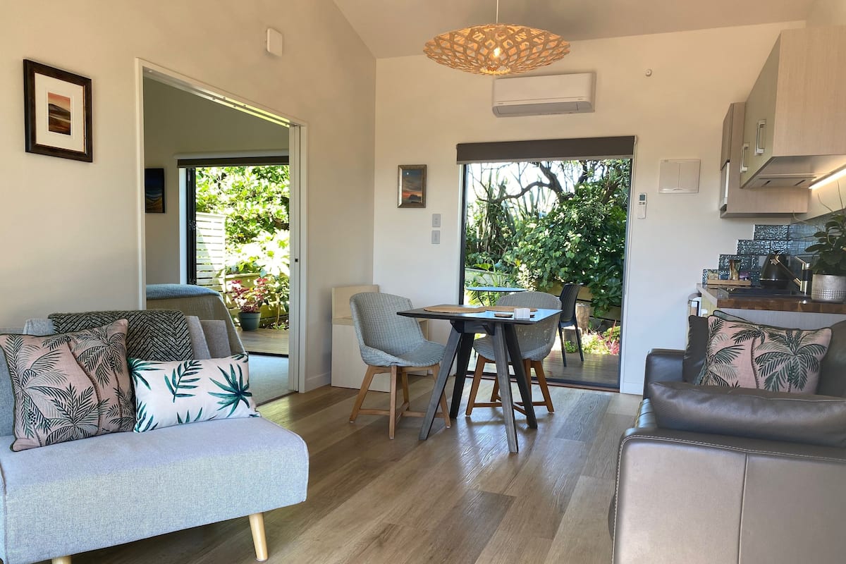 Suite 4 | Living area | 43-inch flat-screen TV with cable channels, TV, heated floors