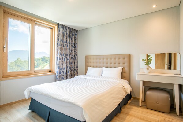 Premium bedding, blackout curtains, free WiFi, bed sheets