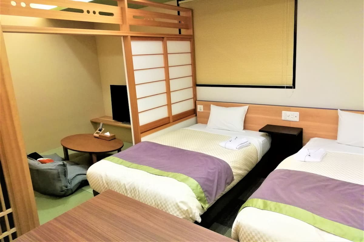 Kamar Twin Deluks, Bebas Asap Rokok | 1 kamar tidur, meja kerja, tirai kedap cahaya, dan Wi-Fi gratis