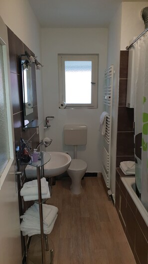 Shower, free toiletries, hair dryer, towels