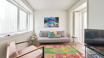 Deluxe Apartment | Living area | Smart TV
