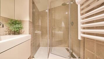 Shower, free toiletries, hair dryer, towels