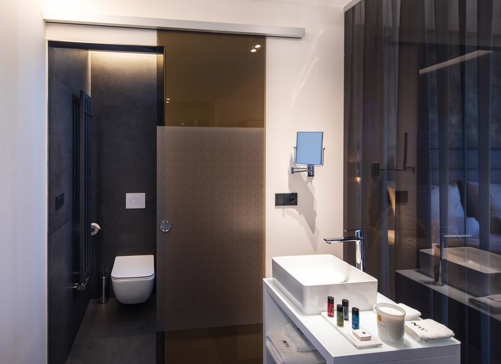 shower, hydromassage showerhead, designer toiletries, hair dryer