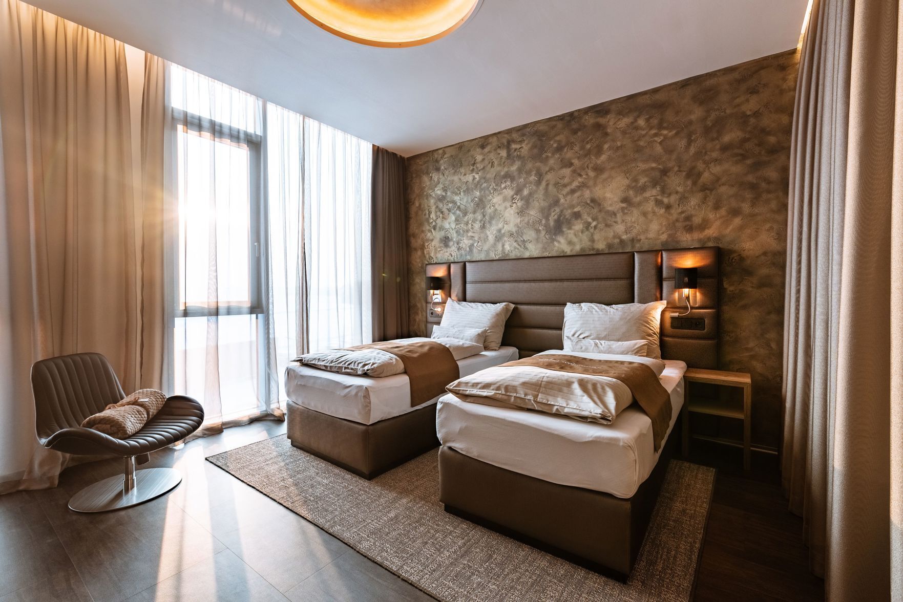 Select Comfort beds, free minibar, in-room safe, desk