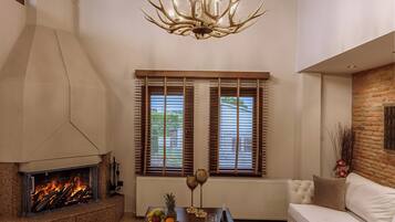 Grand Suite, 3 Bedrooms, Pool View | Living area | Plasma TV