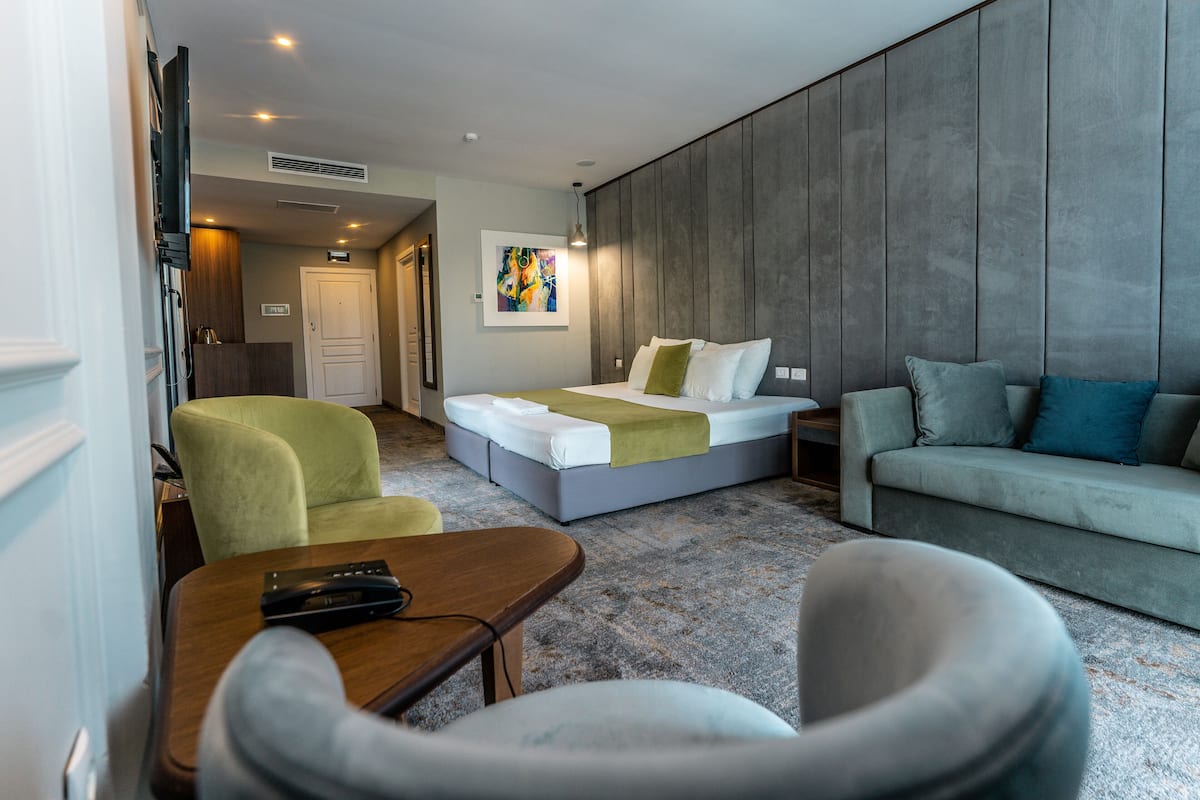 premium room, city view | 3 bedrooms, minibar, in-room safe, blackout curtains