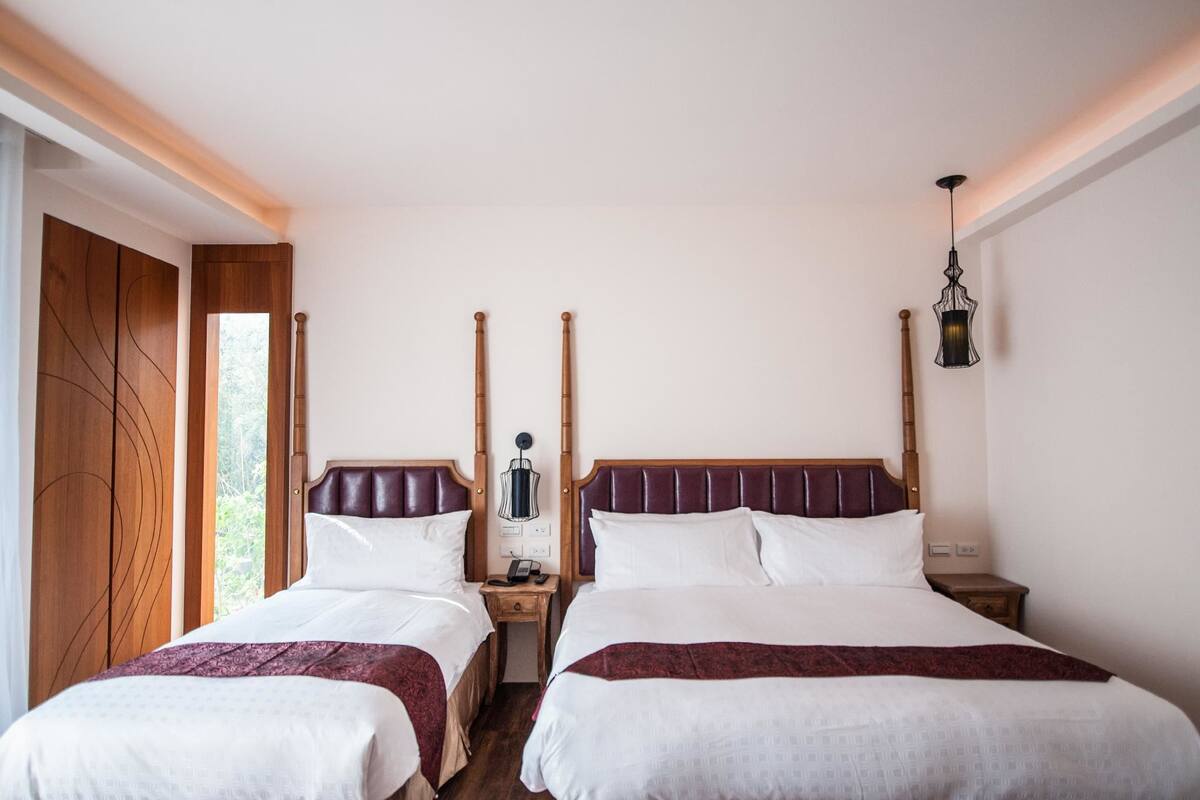 Deluxe Triple Room, Multiple Beds, Partial Ocean View
