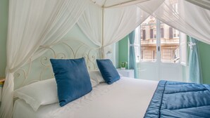 Deluxe Quadruple Room, Balcony, Sea View | In-room safe, desk, blackout drapes, iron/ironing board (on request) - Regina Elena (Naples)