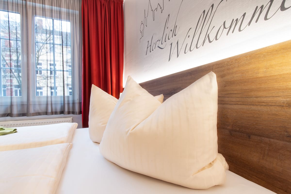 hypo-allergenic bedding, laptop workspace, blackout curtains, free wifi