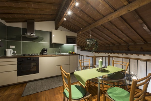 Duplex, 2 Bedrooms | Private kitchen | Full-size fridge, microwave, oven, stovetop