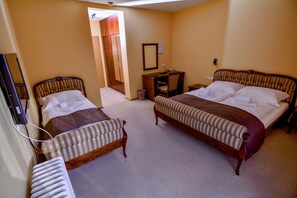 Triple Room | Hypo-allergenic bedding, minibar, in-room safe, blackout drapes