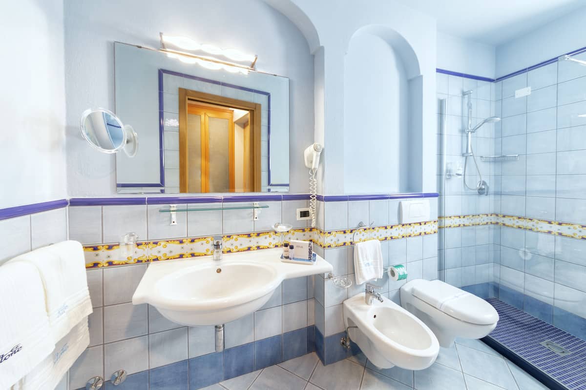 queen superior sea view | bathroom | shower, rainfall showerhead, hair dryer, slippers