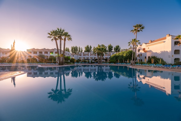 Indoor pool, 2 outdoor pools, open 10:00 AM to 7:00 PM, pool umbrellas