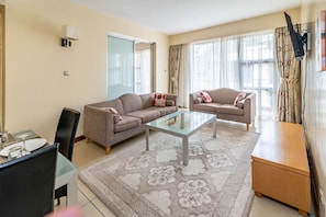 Apartment, 1 Bedroom | In-room safe, desk, blackout drapes, iron/ironing board - Lenana Suites (Nairobi)