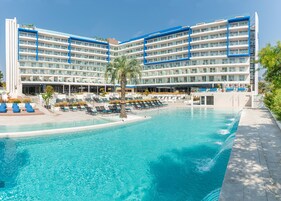 2 outdoor pools, pool umbrellas, sun loungers