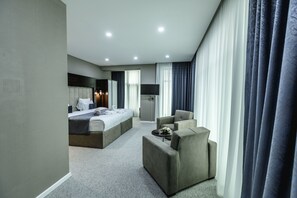 Familjesvit - 1 kingsize-säng med bäddsoffa | Vardagsrum | Platt-tv