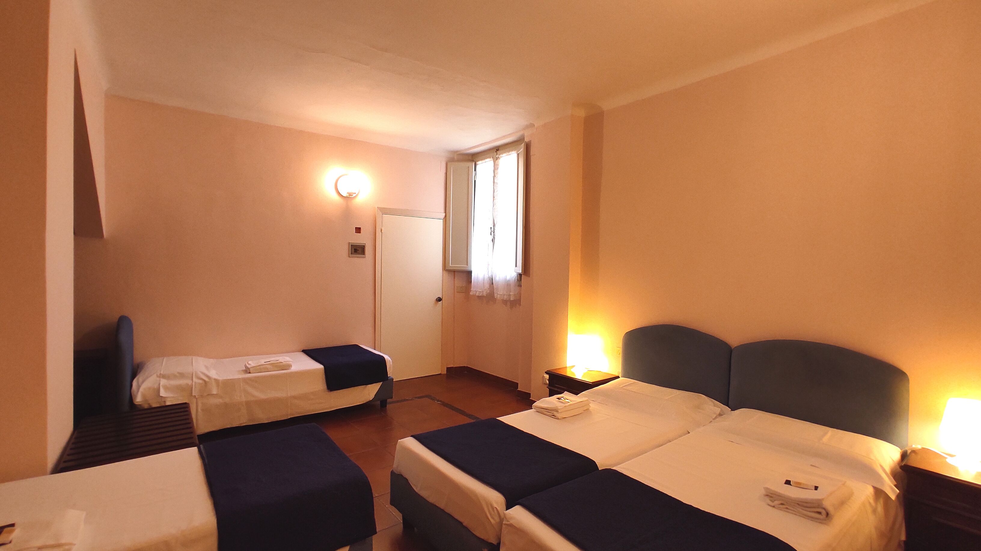 economy quadruple room | 1 bedroom, frette italian sheets, premium bedding, select comfort beds